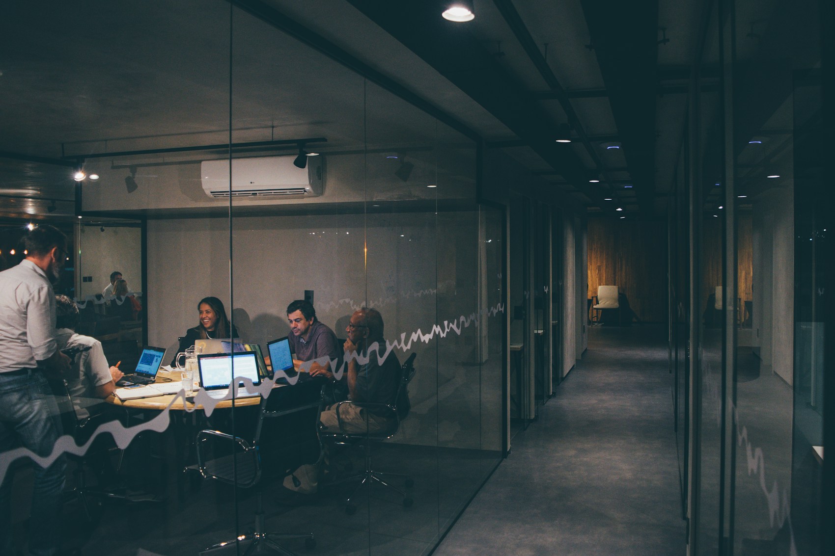 A small team working through a business discussion